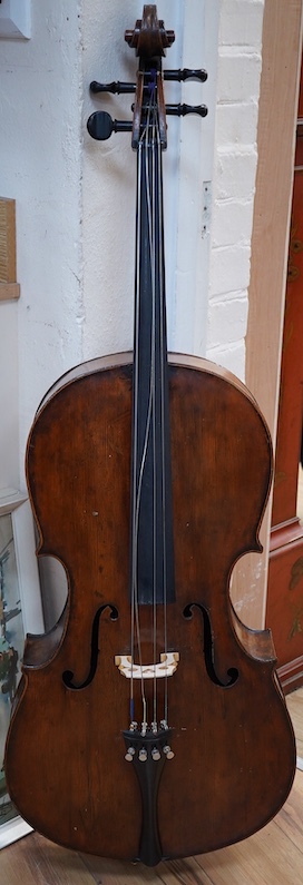 An early to mid 19th century German cello, attributed to Simon Voigt, Simon Voigt label inside with indistinct date, body 74.5cm, with a hard case. Condition - fair to good.